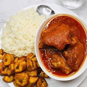 White Rice and stew, plantain, and Beef 